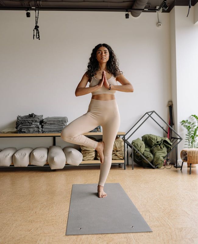 Calm person standing in balance pose